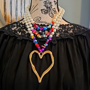 Drama triple strand pearl and stone heart pendant fr: local boutique
